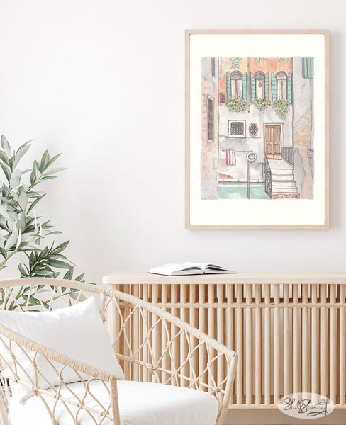 framed artwork in lounge room of quaint Venice canal in Italy Europe showing a villa with green shutters, flowering plants and a beautiful patina, wall art decor by Shell Sherree